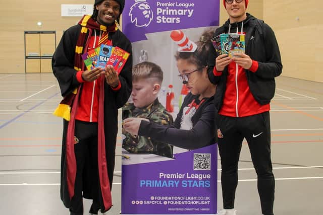 Safc Reading SAFC stars read with kids on World Book Day at the Beacon of Light