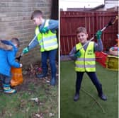 Children from Our Lady of the Rosary Catholic Primary School making use of their litter picking equipment.