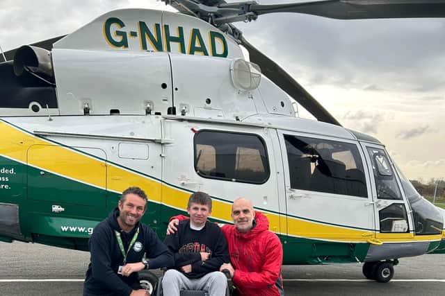 Corey with GNAAS corporate fundraiser Ben Sisson and paramedic Ian Grey