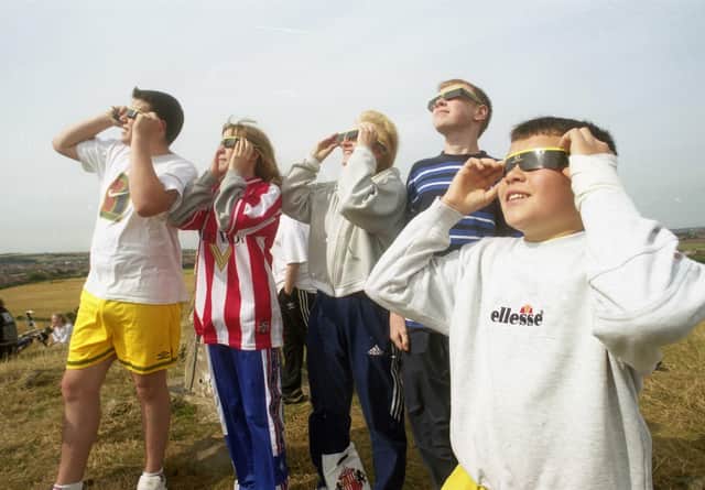 Watching the eclipse over Tunstall Hill were Simon Rossi, Charlotte, Eleanor and Nicholas Farrell and Fernando Rossi.