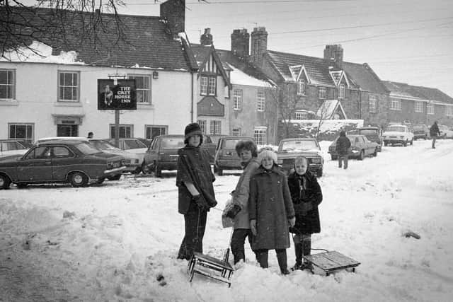 No fun for motorists but these youngsters had great fun on their sledges on March 19, 1979.