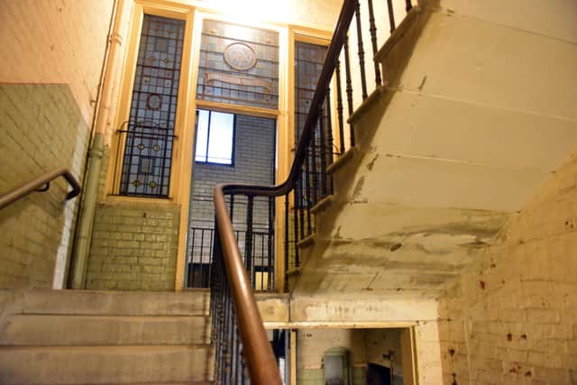 A stained glass window inscribed in Hebrew is still intact