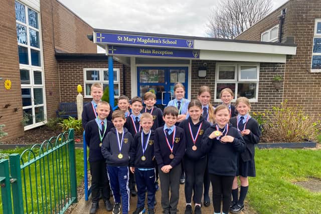 Children from St Mary Magdalen’s Catholic Primary School with their bronze medals.