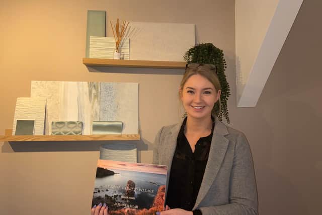 Caragh with samples of some of the materials used in the show home. Pic credit Nikita McConnell.