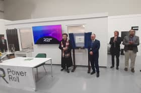 Princess Anne unveiling a plaque to mark her visit to Power Roll.