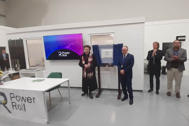 Princess Anne unveiling a plaque to mark her visit to Power Roll.