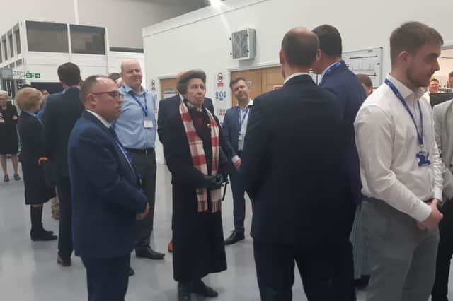 Princess Anne chatting to staff at Power Roll.