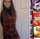Nancy Miller, seven, has collected over 200 chocolate eggs to donate to people.