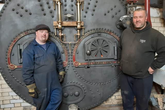 David Rowell, 38, and Jamie Purvis, 22, operating the engine's boilers.