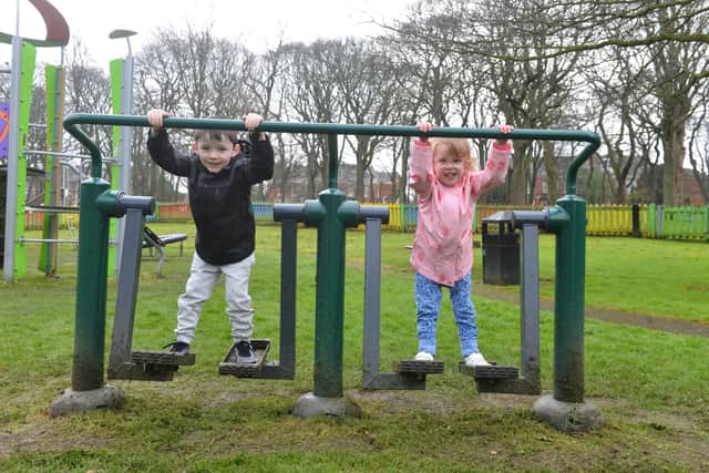 New playground equipment and improvements at Backhouse Park with twins Christoper and Amelia Bruce, 4.

