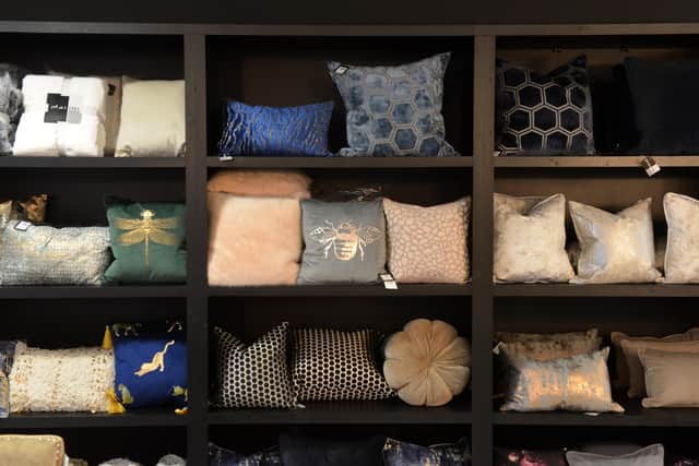 The shop sells a wide range of decorative cushions