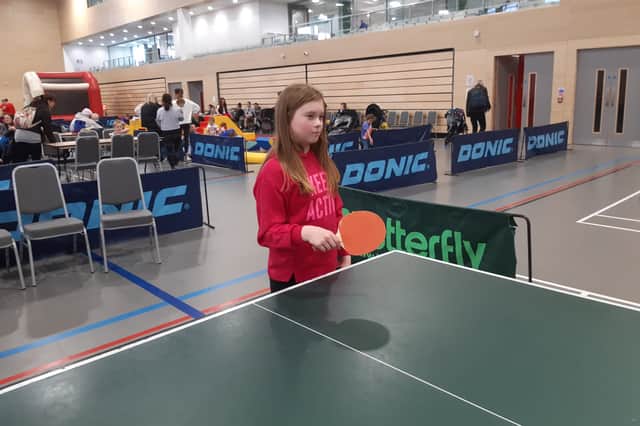 Bethany Minniss, 10, enjoying a game of table tennis. 