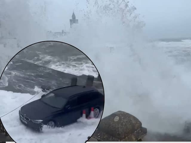Waves soak car as Storm Kathleen batters British coast.