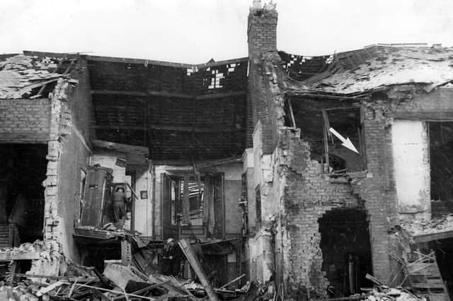 The scene of an air raid in which a house was hit in Sunderland - but a child was remarkably rescued despite the devastation.