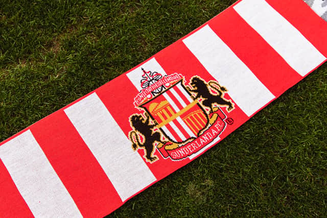 Submitted pictures of the world's longest multi-club football scarf.