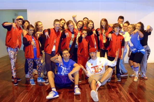 Britains Got Talent act Twist & Pulse (seated front) with street dancers during their workshop at Studio Jam.