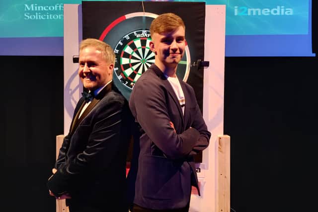 Pupil Andrew Hewitt, 16, and Assistant Headteacher Andrew Davis at the finals night of the darts competition. 