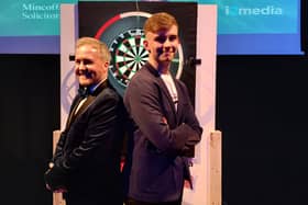 Pupil Andrew Hewitt, 16, and Assistant Headteacher Andrew Davis at the finals night of the darts competition. 