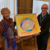 Barbara Hume and Mr Maged Habib with the artwork created by Tom Hume