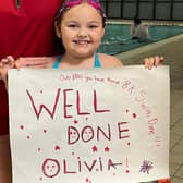 Olivia after completing her swimming challenge.
