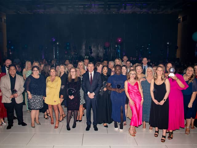 STSFT Staff Recognition Awards 2024  winners pictured with Trust Chief Executive Ken Bremner MBE and Director of Corporate Affairs Andrea Heatherington, in red to the left. Submitted picture.