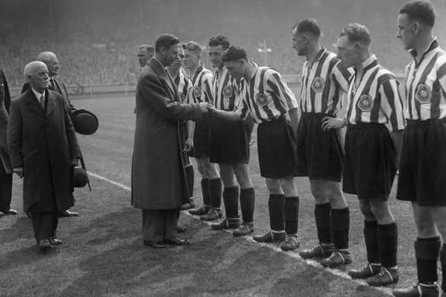 The big moment in the pre match preliminaries as Raich Carter presents his players to King George VI. 
Lining up for the introduction are (left to right) Len Duns, Jimmy Gorman, Charlie Thomson, Bert Johnston, Sandy McNab, Eddie Burbanks, and Patsy Gallacher.