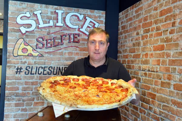 Reporter Neil Fatkin takes on the 24 inch pizza challenge.