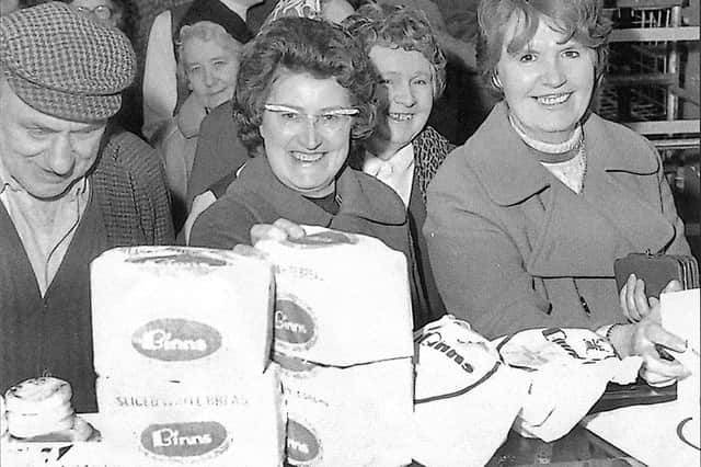 These customers were queuing for fresh bread from Binns in 1975.