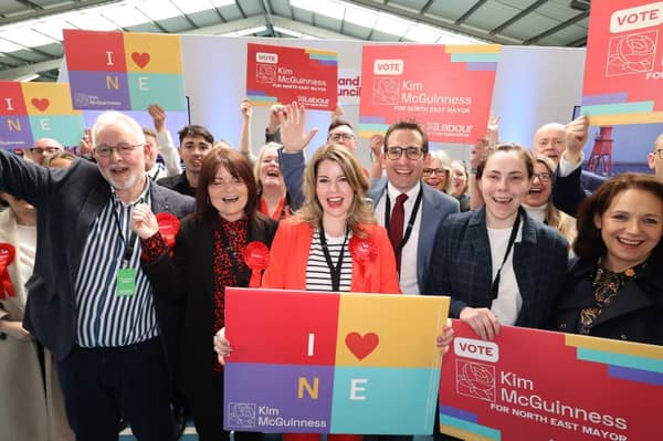 Labour candidate Kim McGuinness (centre, in red) celebrates with supporters after winning the North East Mayor election at the Silksworth Tennis Centre in Sunderland this afternoon. Picture c/o North News.