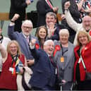 Labour supporters celebrating on the count floor after Alison Smith (grey suit, red rosette and orange tag) won the Redhill seat in Sunderland, pictured along with Labour MP Sharon Hodgson (red suit jacket).