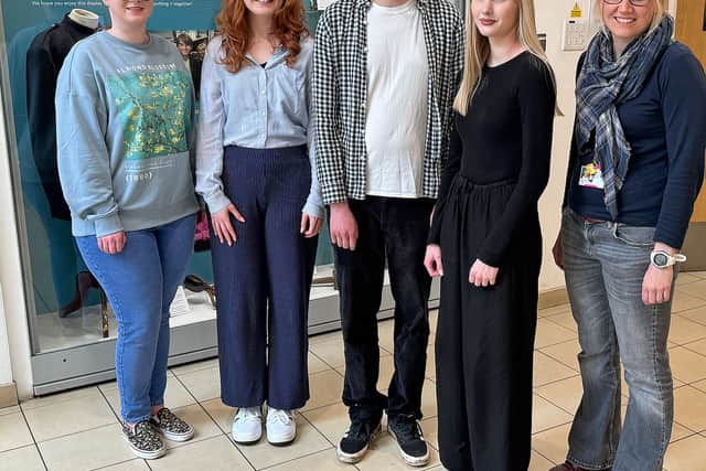 Anneke Hackenbroich, right, Collections Care Development manager at the museum, with the four Young Curators.