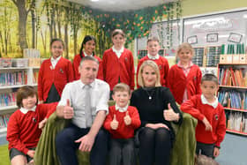 Staff and children at Rickleton Primary School give a thumbs up to their latest Ofsted report.