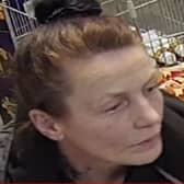 The police would like to speak with this woman.