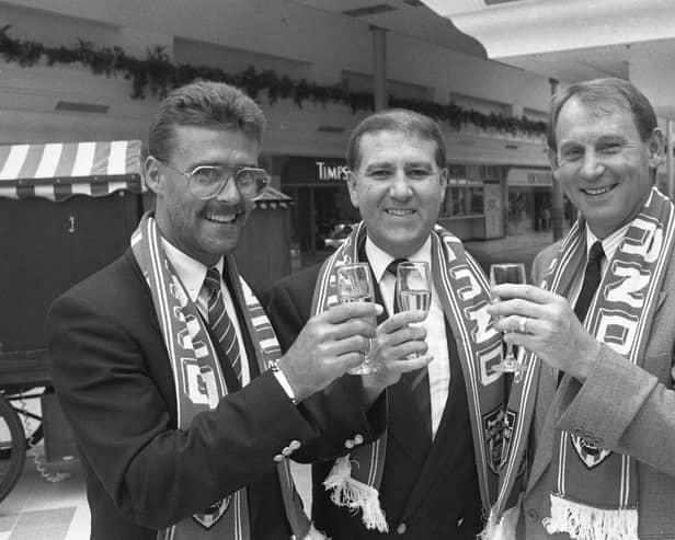 Viv Busby, left, with SAFC chairman Bob Murray and manager Denis Smith at the opening of the supporters' shop in The Bridges in June 1990.