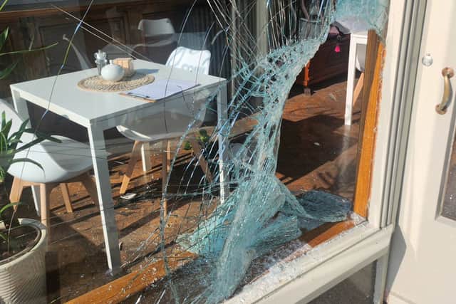 Thieves smashed a window to gain entry