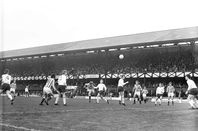 Sunderland on the attack during the 1972 Cup Final against Burnley.
Jimmy Hamilton (centre) throws himself forward to deliver this header from a right wing corner.