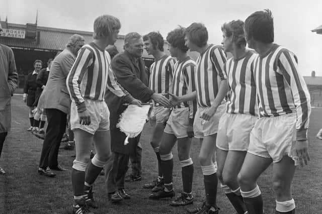 Sunderland captain, Mick Horswill, presents his Sunderland team mates to the secretary of the Football League, Alan Hardaker.