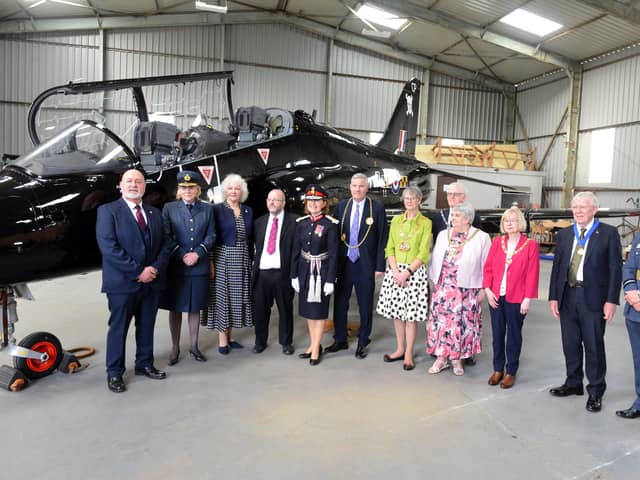 Dignitaries welcome the Hawk to the museum.