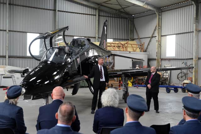 RAF pilot Richard Pargeter, left and museum chairman David Charles talk to dignitaries at the unveiling of the Hawk.