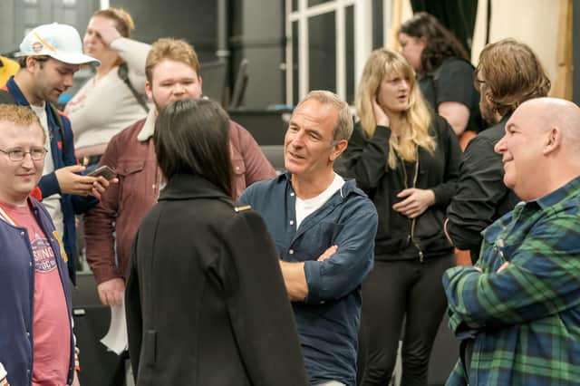 Robson Green talking to students.