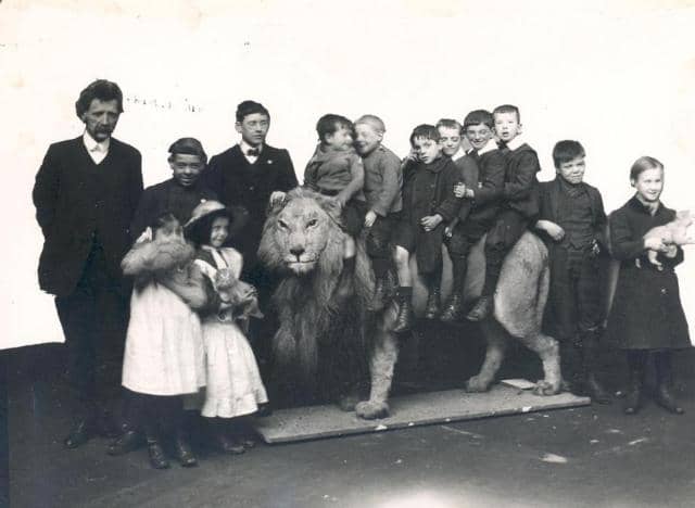 Wallace the Lion in 1913 with children from Sunderland Council Blind School