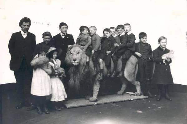 Wallace the Lion in 1913 with children from Sunderland Council Blind School