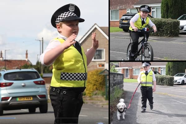 Finley Bollen, six, dresses in an officer's hat and outfit everyday - keeping his town and its people safe on the roads. 