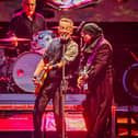 Bruce Springsteen and guitarist Steven Van Zandt turned the Sunderland rain into part of the experience. Picture by Calum Buchan.