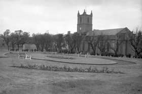 The churchyard which got a new look in June 1960.