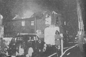 The scene on the street as the fire rages in the building in Castletown.