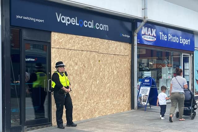 A police officer on duty outside a vape shop in Sunderland which was targeted on Friday, August 2.