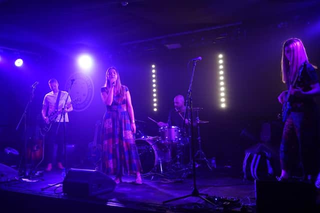 The band performing at Independent