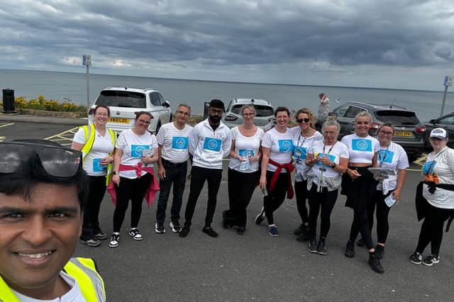 Spreading the message on the sea front.