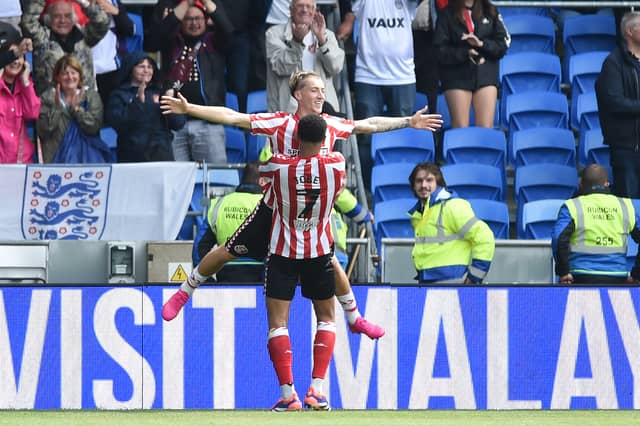 Jack Clarke celebrating in front of Sunderland fans
